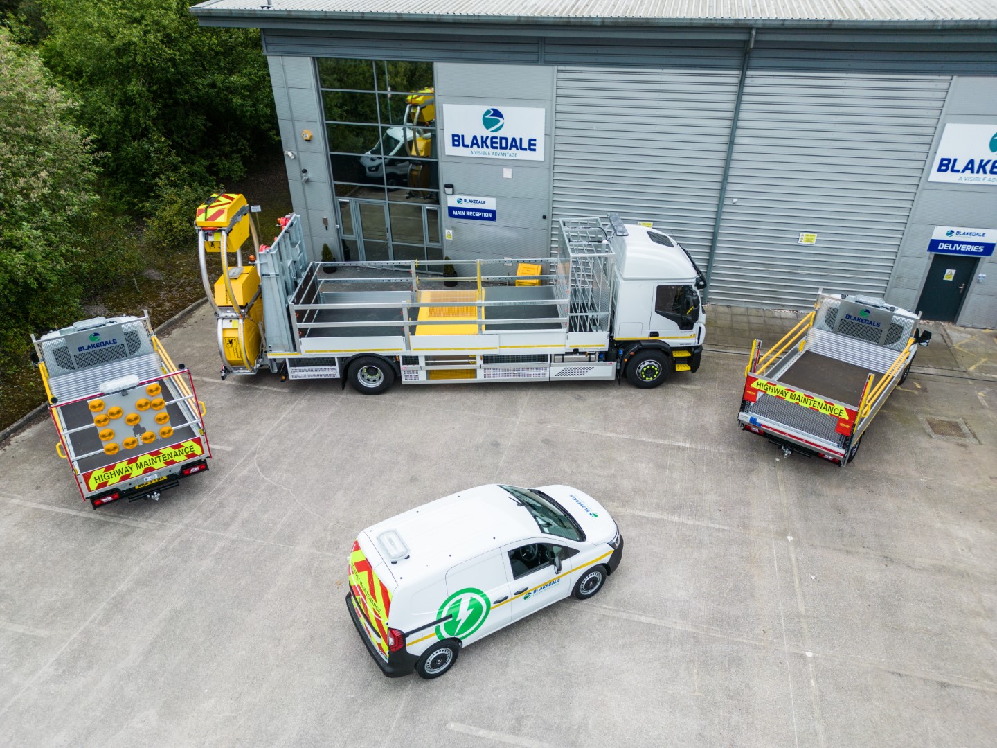 Blakedale head office with traffic management vehicle range in the yard birdseye view