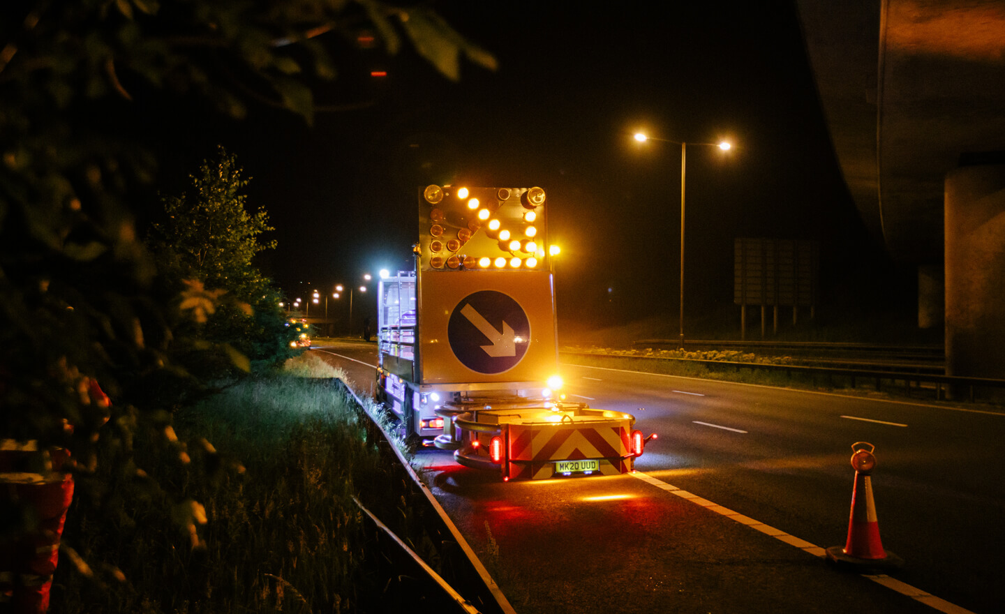Impact protection vehicle with Scorpion II crash cushion on motorway maintenance night job