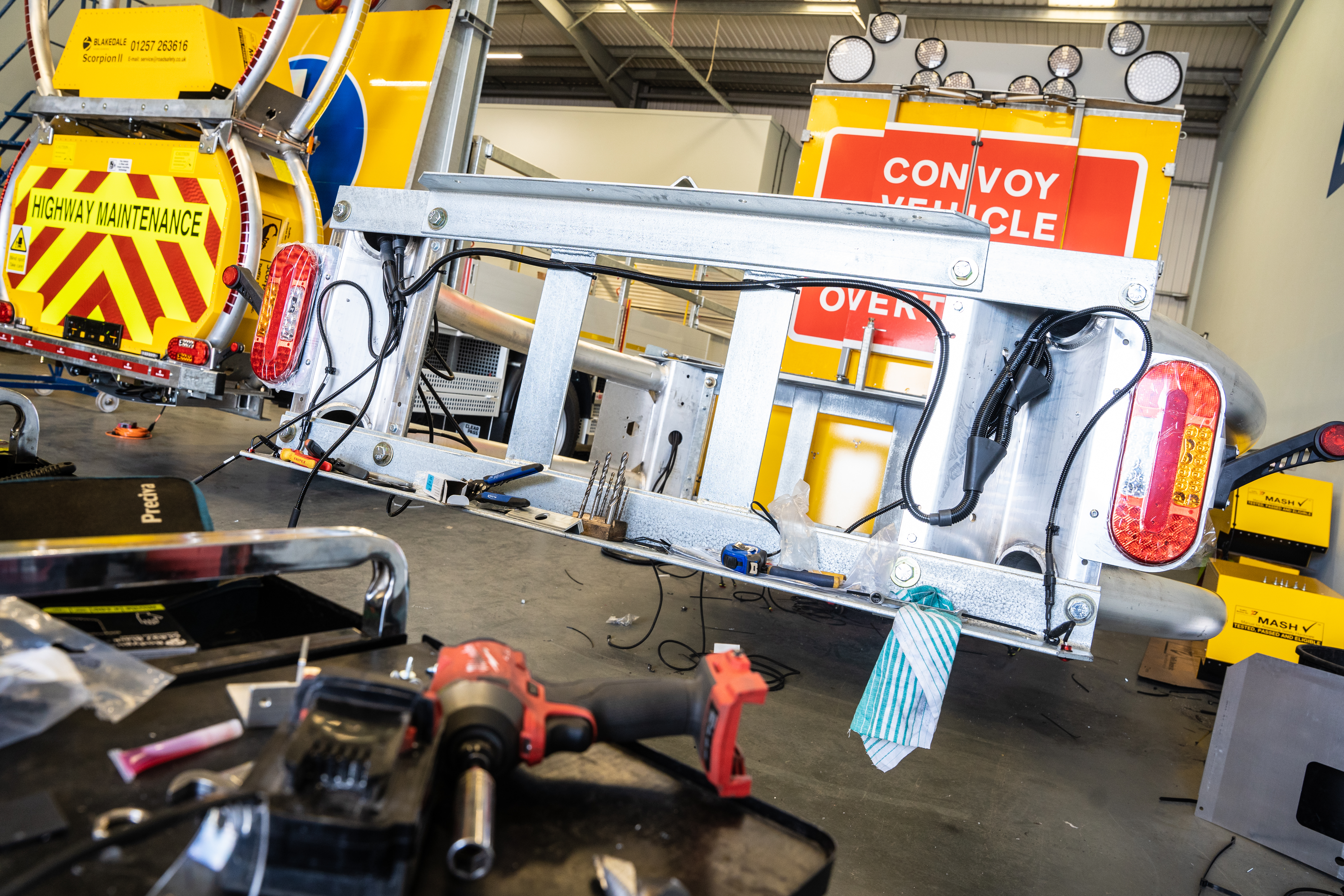 Impact protection vehicle being fitted with Scorpion II crash cushion 